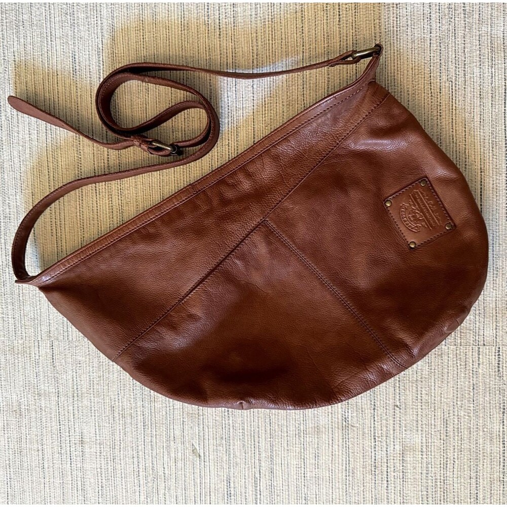 Ashwood leather sling bag — brown cognac